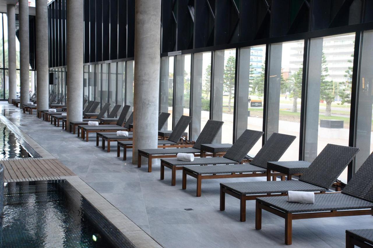 享受普恩塔德尔埃斯特酒店 埃斯特角城 外观 照片 The pool at the hotel